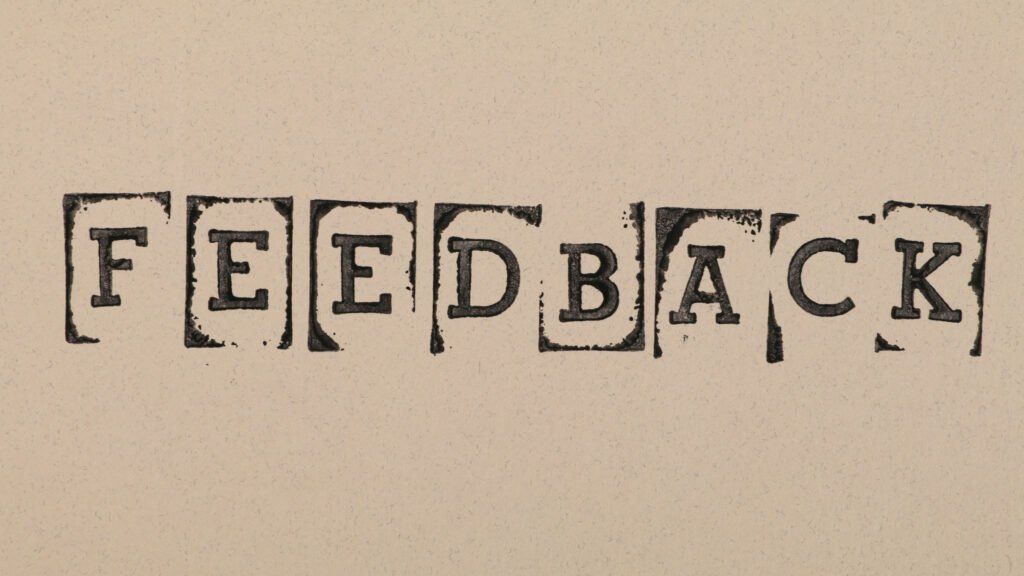 The word feedback is written on a beige background with a discount code.